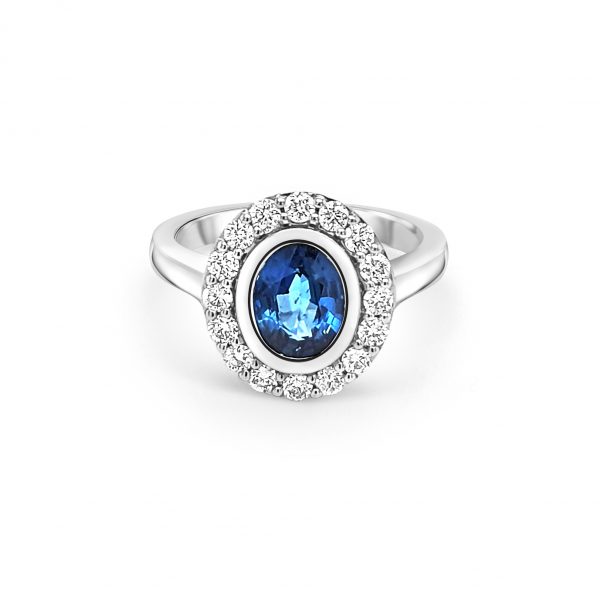 18ct White Gold Blue Sapphire and Diamond Halo Ring